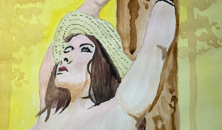 London Andrews leaning against a&nbsp;tree